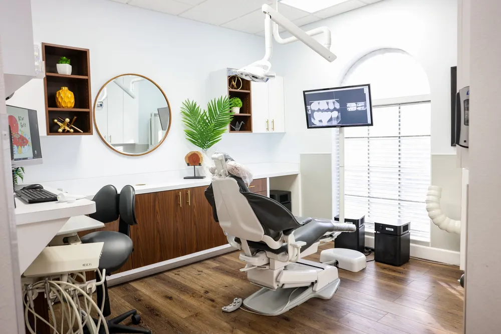 Dental exam room at Joshua M. Ignatowicz DMD and Associates with a dental chair and treatment equipment