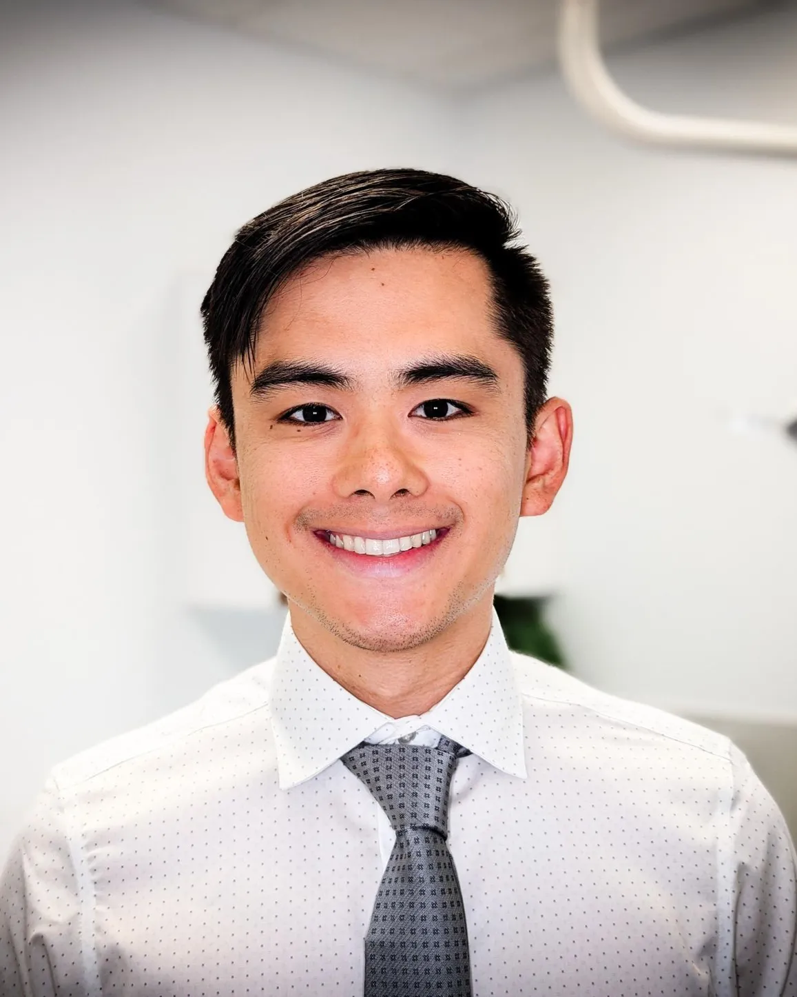 Dr. Nathan Chen smiling in a professional photo at Joshua M. Ignatowicz DMD & Associates