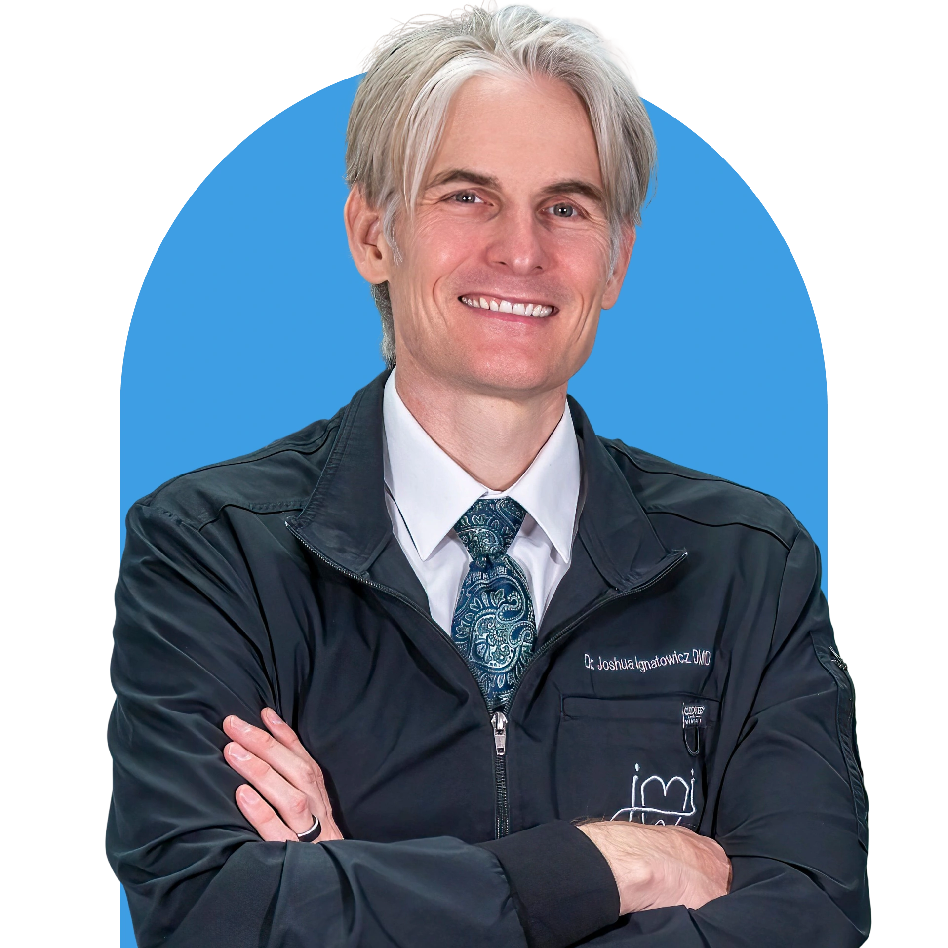 Dr. Joshua Ignatowicz smiling in a circular profile photo for the about us page